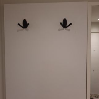 Recibidor con zapateros y espejo