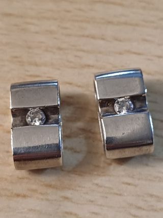 Dos colgantes gemelos para chico o chica. Plata