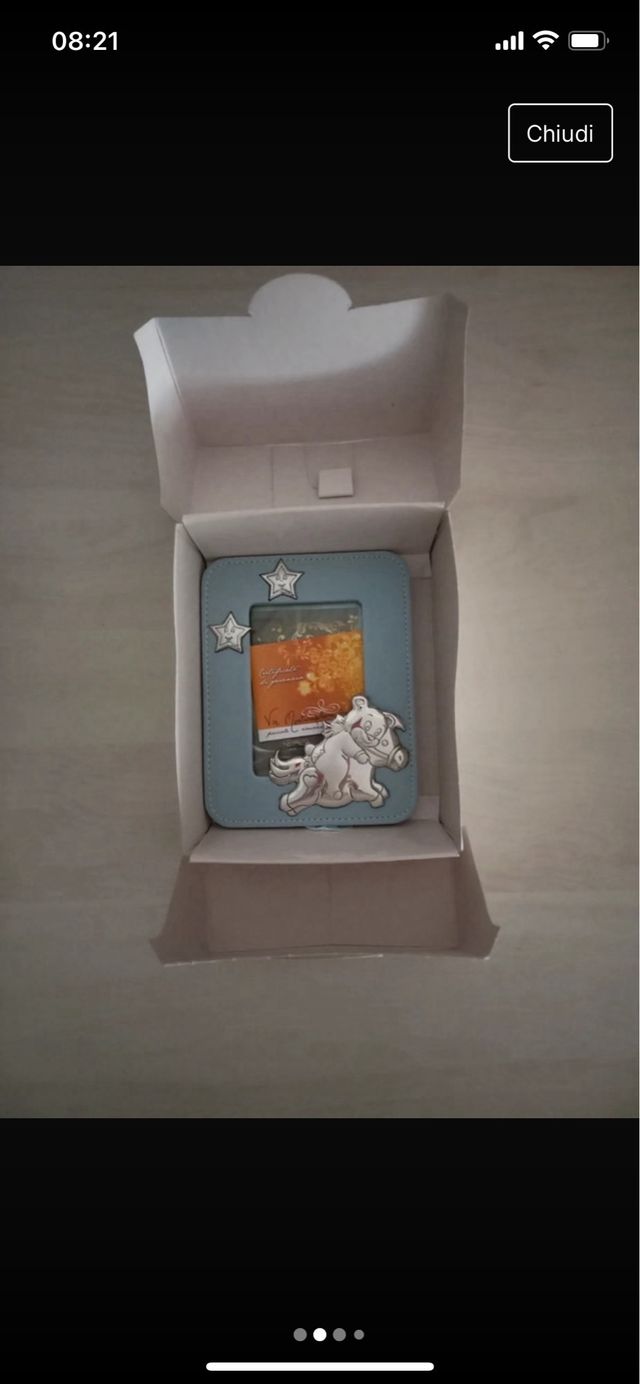 Portafoto argento e pelle celeste