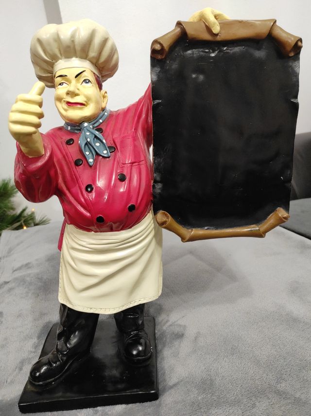 Figura cocinero menú carta con pizarra