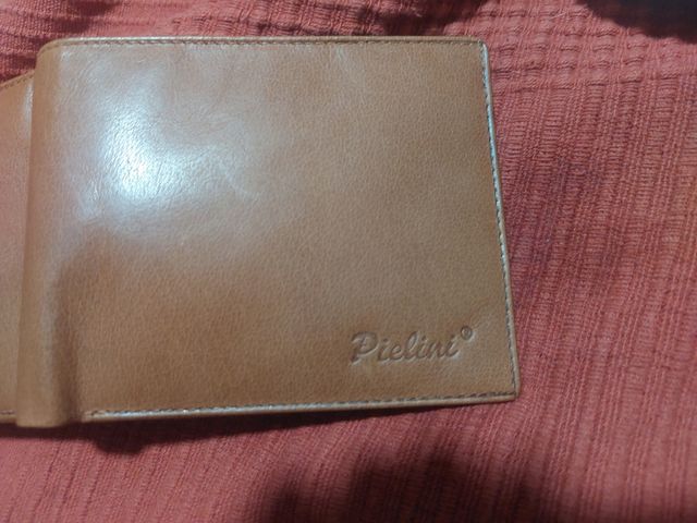 Cartera de piel, Pielini nueva.