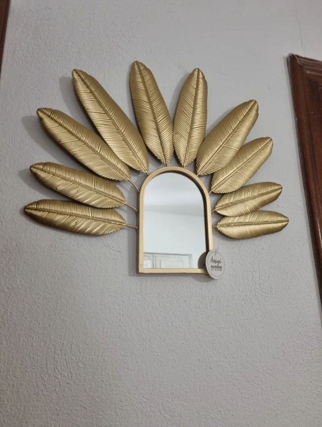 Espejo plumas doradas