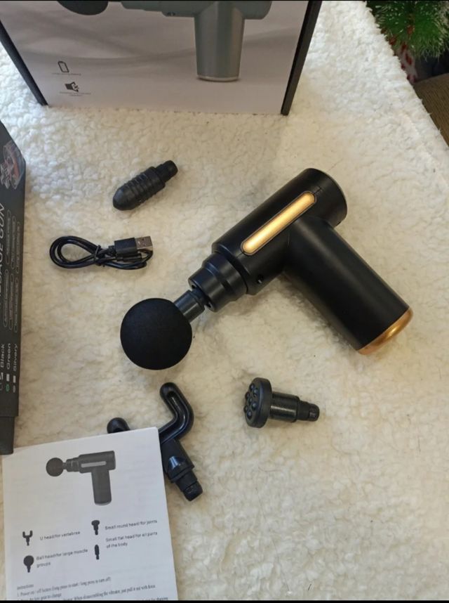 Pistola masajeador a con cabezales