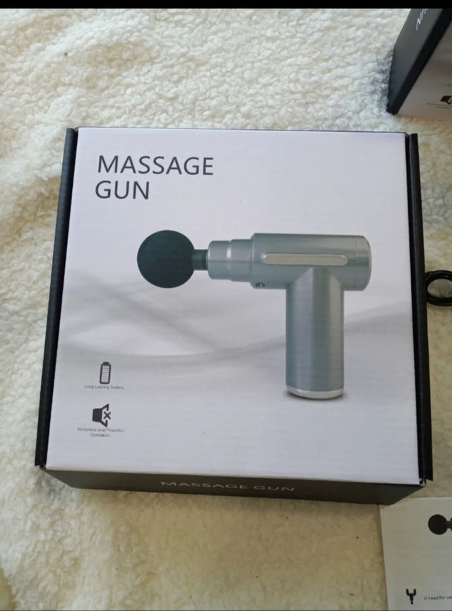 Pistola masajeador a con cabezales