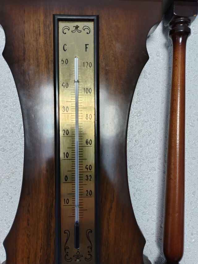 Reloj antiguo vintage termometro