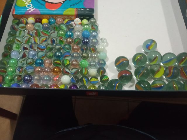 *Canicas grandes y pequeñas