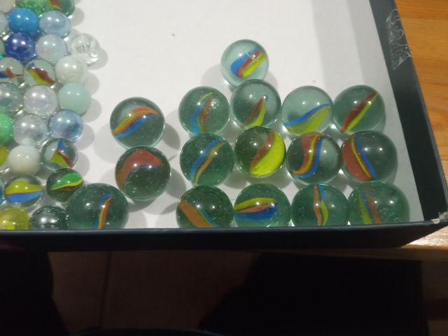 *Canicas grandes y pequeñas