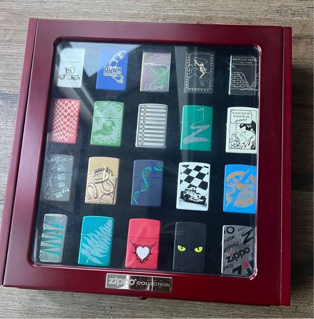 Coleccion 40 zippos con expositor