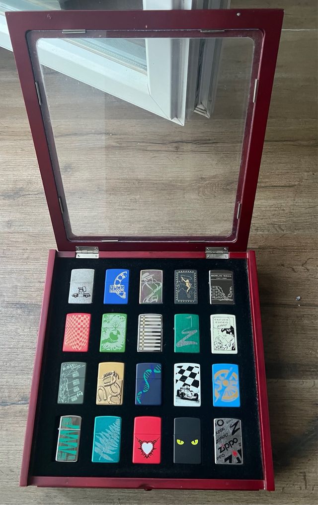 Coleccion 40 zippos con expositor