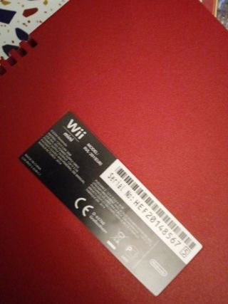 Consola wii mini y juegos roja