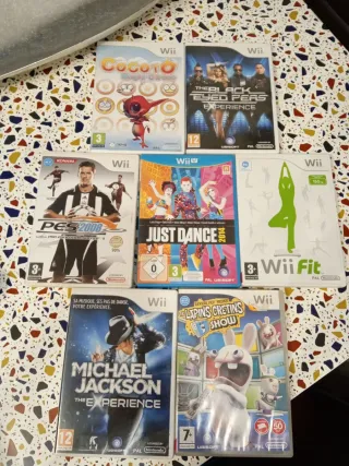 Consola wii mini y juegos roja