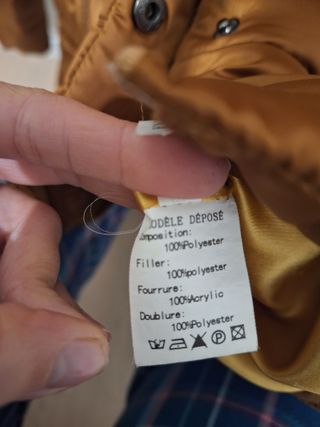 Plumífero dorado mostaza de Escandelle