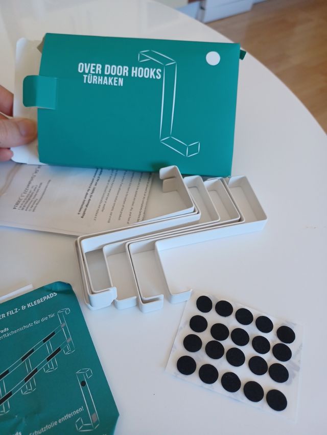 Ganchos percheros puerta