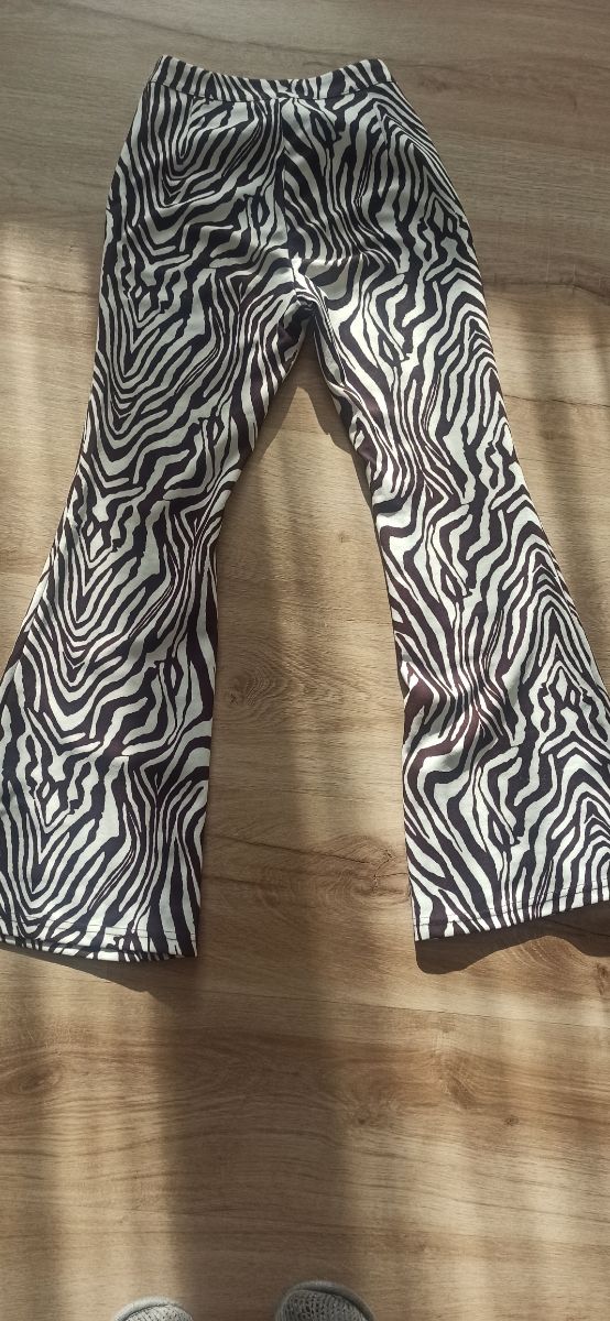 Pantalón campana animal print