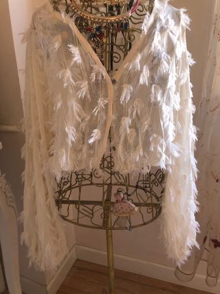 Fiesta chaqueta plumas nueva solo 35