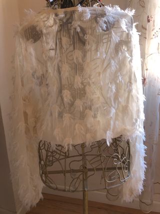 Fiesta chaqueta plumas nueva solo 35