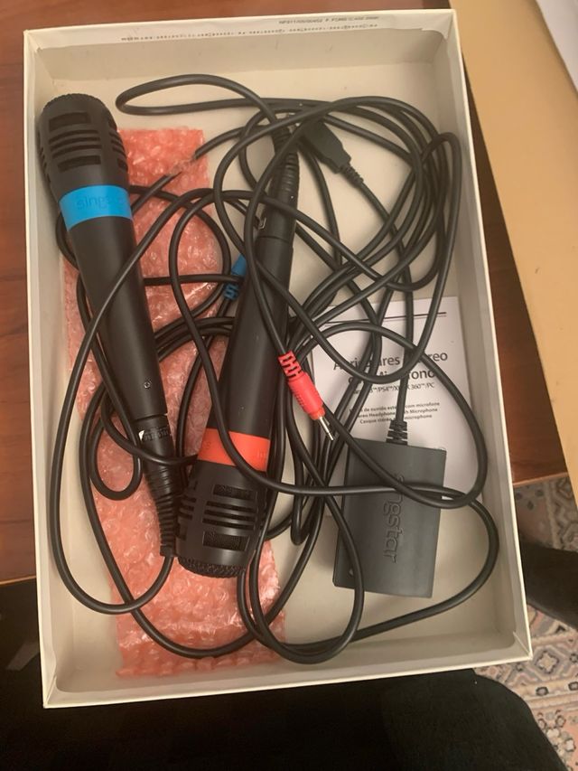 Play station 3 slim  15 juegos mandos y microfonos