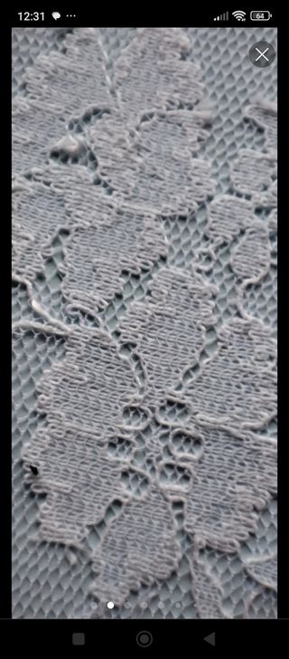 10 metri di merletto bianco