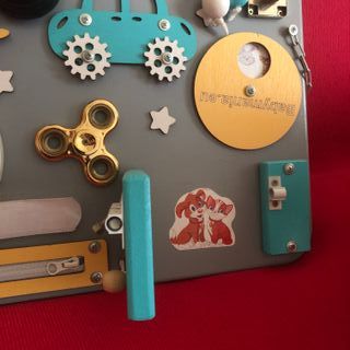 Busy board Pannello sensoriale Montessori in legno