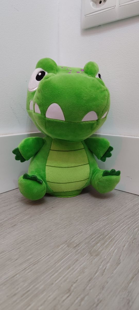Dinosaurio de peluche