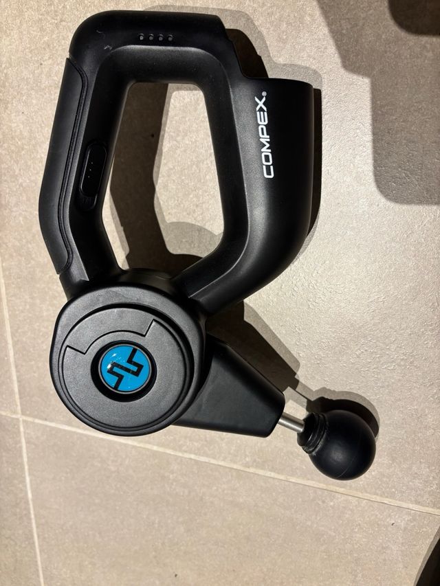 Pistola masajeadora Compex