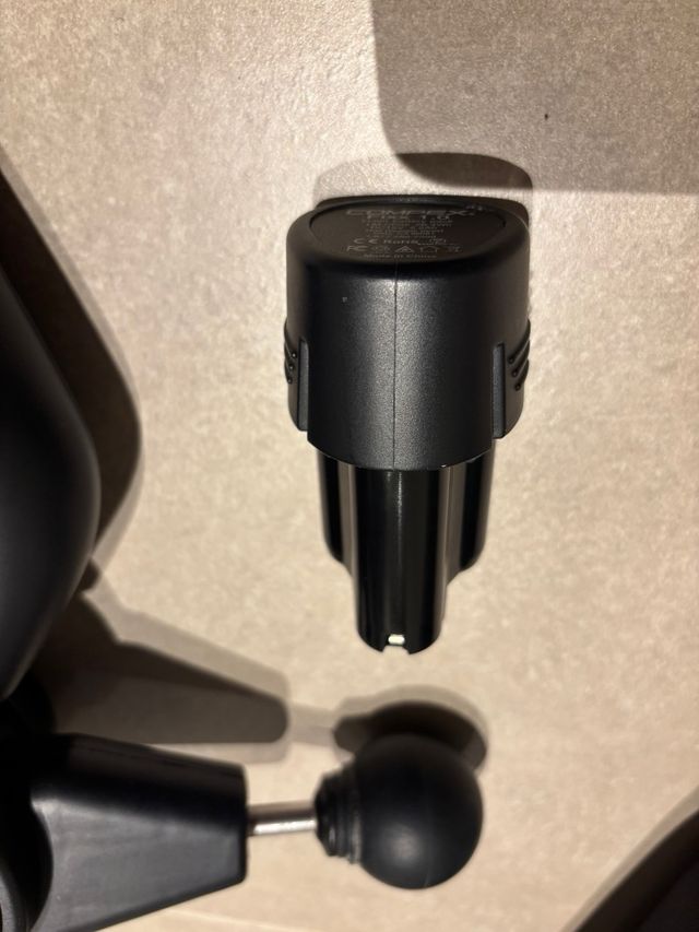 Pistola masajeadora Compex