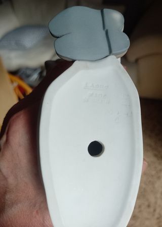 Lladró figura de niña con zapatos