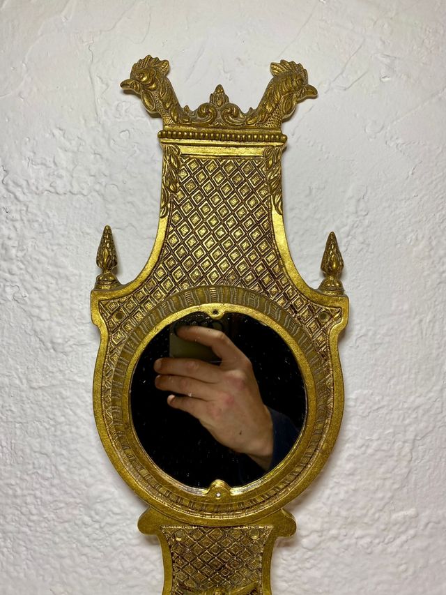 Antiguo espejo de bronce