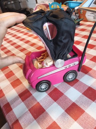 Cochecito y dos mini bebés