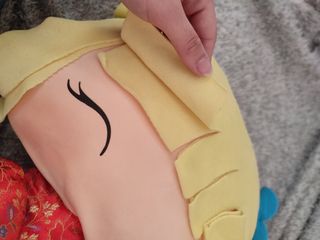 Muñeca kumis guarda pijamas