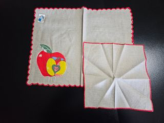 Coppia di tovagliette con tovaglioli