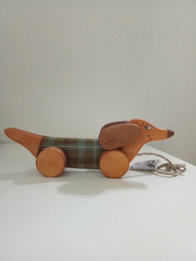 Pero salchicha cuerda madera