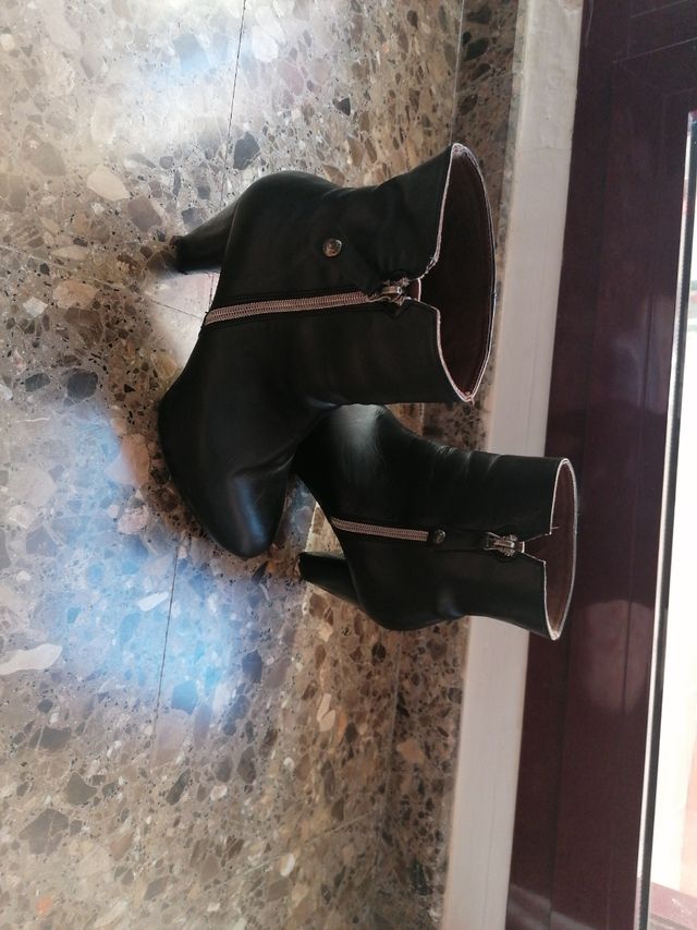 Botas con tacon de arreglar