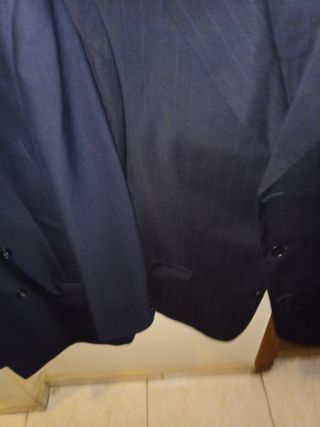 Tres trajes de hombre