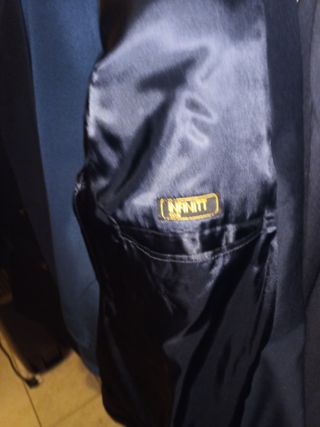 Tres trajes de hombre