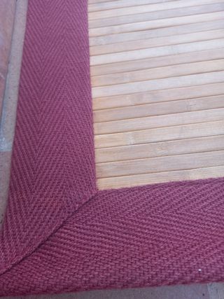 Dos alfombras vegetal cenefa textil