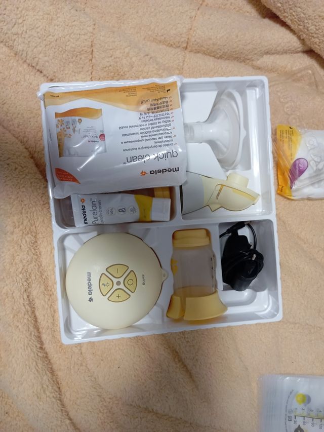 Medela sáca leche electrico 