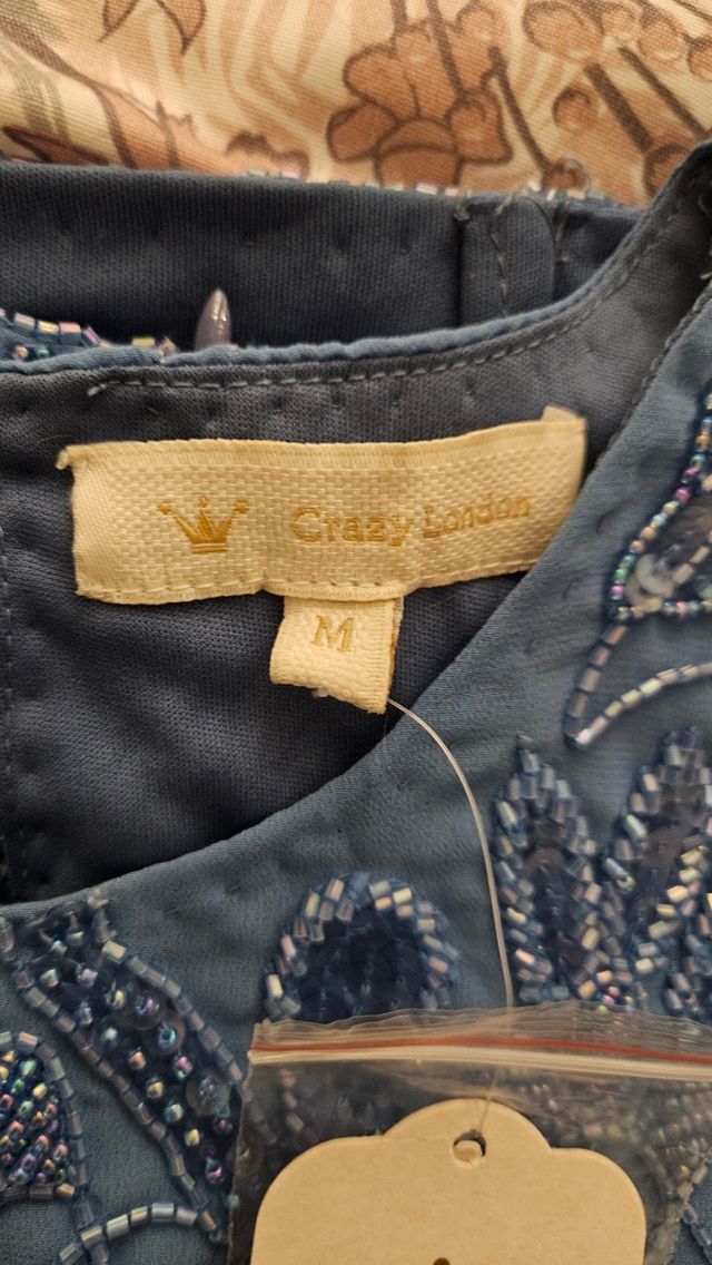 Top lentejuelas azul