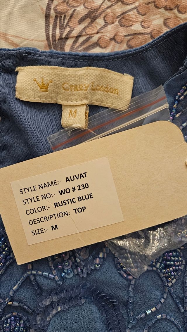 Top lentejuelas azul