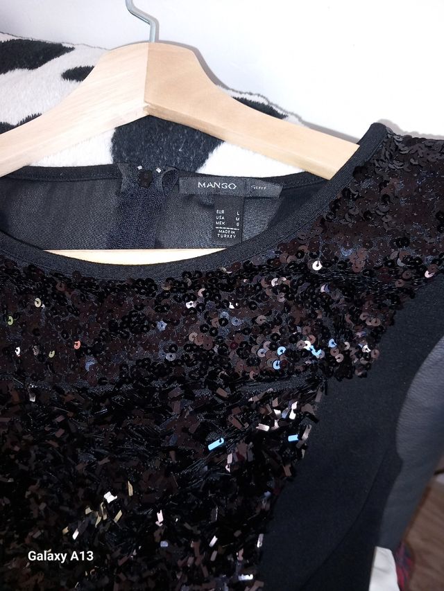 Abito nero in paillettes