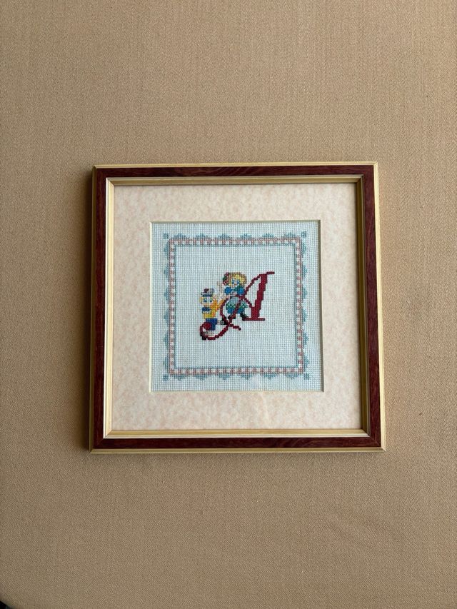 Cuadro con letra bordada