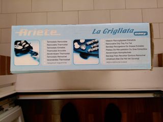 Parrilla de teflón con termostato extraíble.