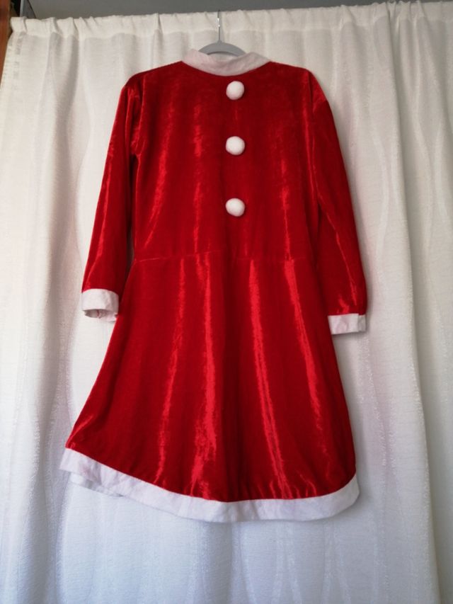 Disfraz Mama Noel con regalo.