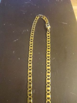Cadena con cristo chapada en oro