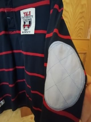 Polo manga largay codera,azul marinoconrayas rojas
