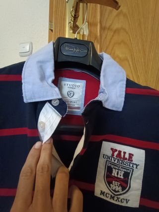 Polo manga largay codera,azul marinoconrayas rojas