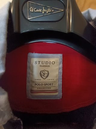 Polo manga largay codera,azul marinoconrayas rojas