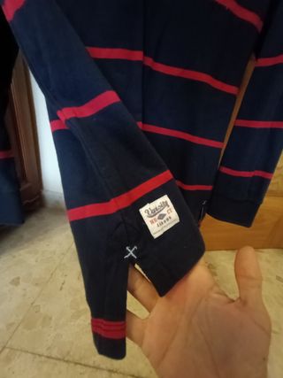 Polo manga largay codera,azul marinoconrayas rojas
