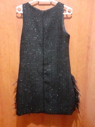 Espectacular vestido con plumas de avest