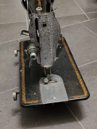 Máquina de coser alfa